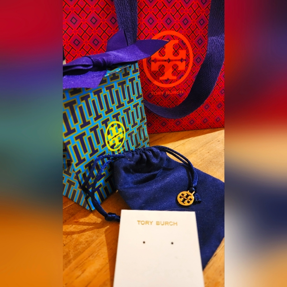 Tory Burch bag, dustbag, and earrings holder